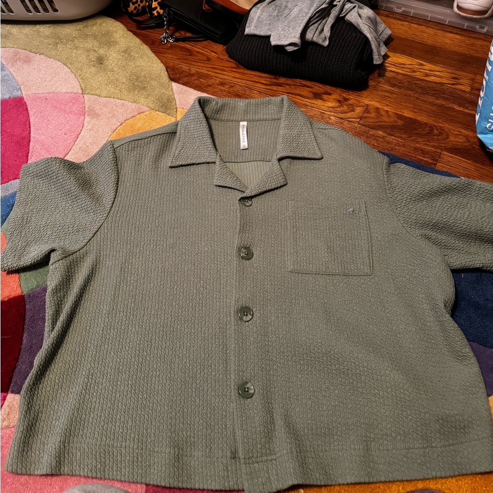 grey loose button up. size M. from fabletics